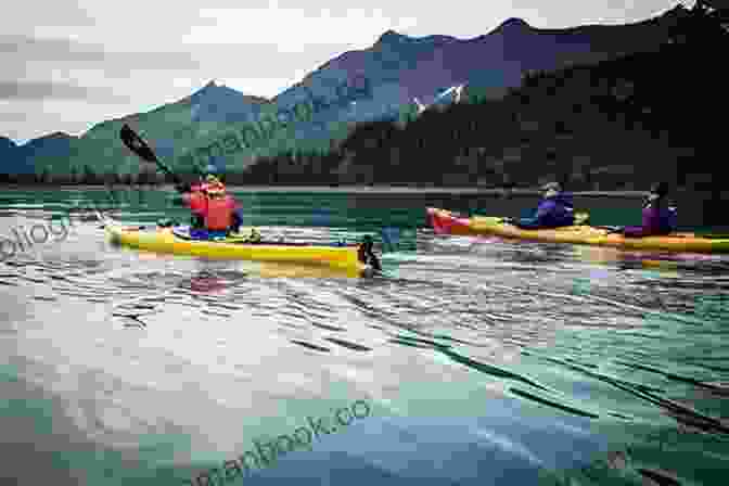 A Group Of Kayakers Paddling Through A Fjord In Kenai Fjords National Park Tip Of The Iceberg: My 3 000 Mile Journey Around Wild Alaska The Last Great American Frontier